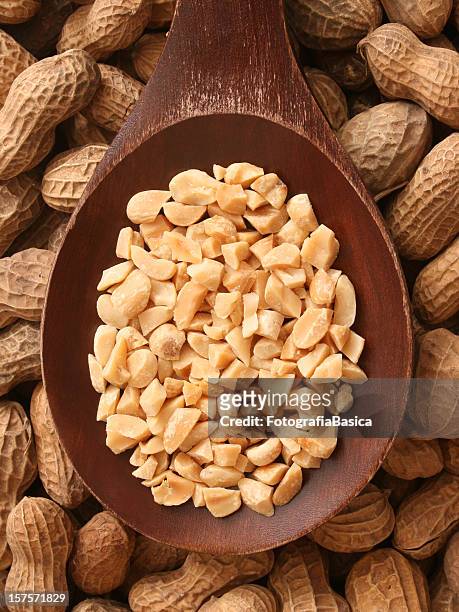 chopped peanuts - pared stock pictures, royalty-free photos & images