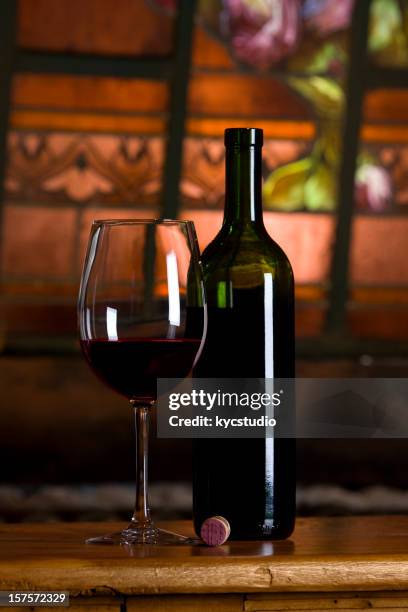 red wine bottle and glass - malbec stock pictures, royalty-free photos & images