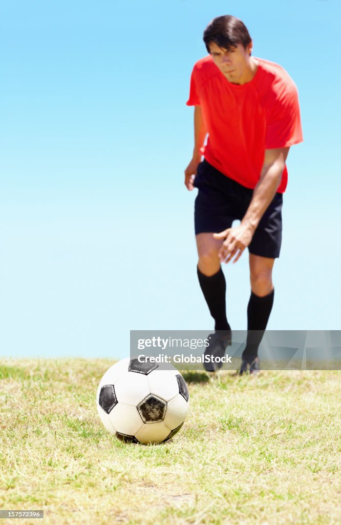 Pro footballer about to take a football shot