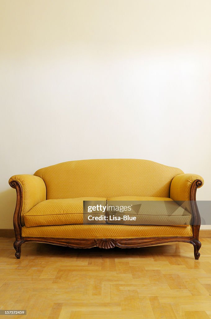 Vintage Yellow Sofa. Copy Space