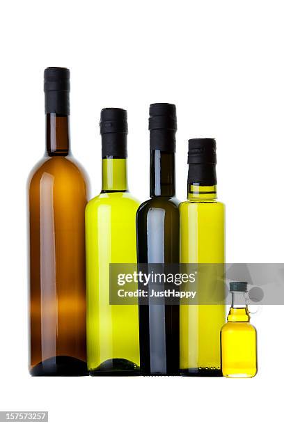 organic olive oil and different  bottles - vinegar stockfoto's en -beelden