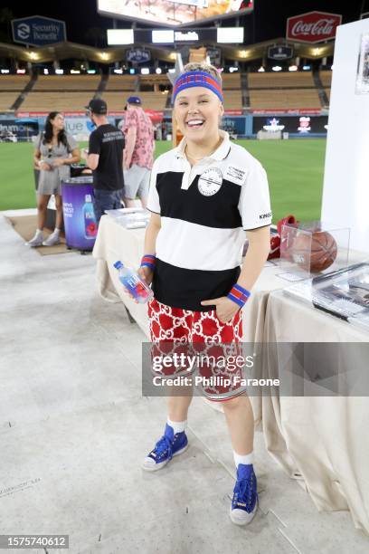 JoJo Siwa with FIJI Water and JUSTIN Vineyards and Winery at Ping Pong 4 Purpose 2023 at Dodger Stadium on July 27, 2023 in Los Angeles, California.