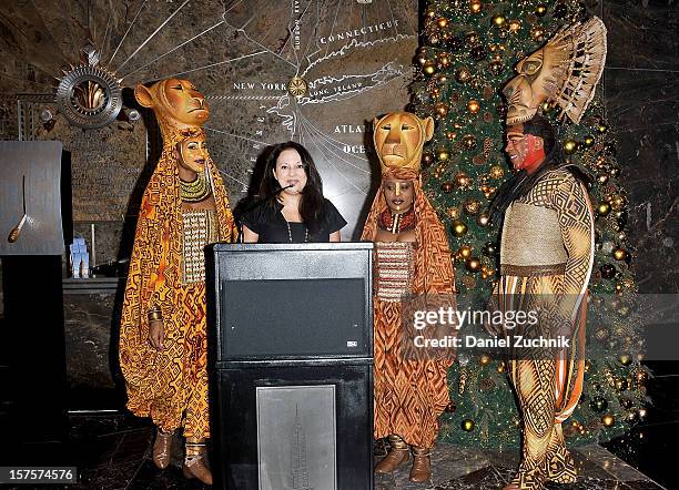 Chondra La-Tease Profit, Lindiwe Diamini and Alton Fitzgerald White attend the lighting ceremony honoring the 15th anniversary of Broadway's "The...