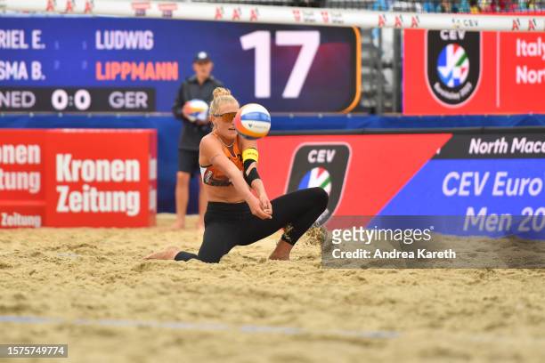 Brecht Piersma of the Netherlands digs during the quarterfinal match between Emi van Driel and Brecht Piersma of the Netherlands and Laura Ludwig and...