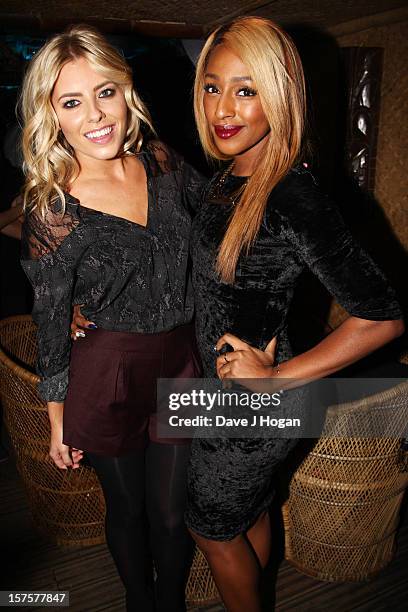 Mollie King and Alexandra Burke attend the Mahiki Coconut Christmas Party to celebrate the launch of Mahiki Coconut in Sainsburys and Tesco at Mahiki...