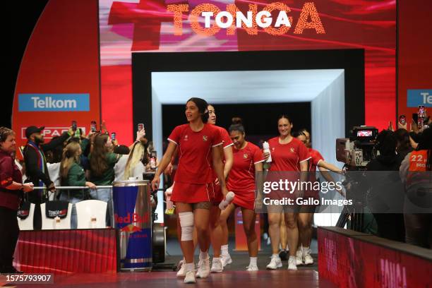 Hulita Veve of Tonga leads her team onto court prior to the Netball World Cup 2023, Playoff 2 match between South Africa and Tonga at Cape Town...