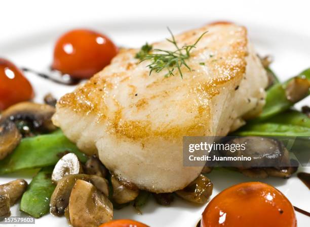 saute fillet of seabass - sea bass stock pictures, royalty-free photos & images
