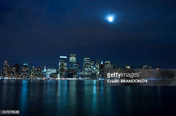 moon light in new york city - moon horizon stock-fotos und bilder