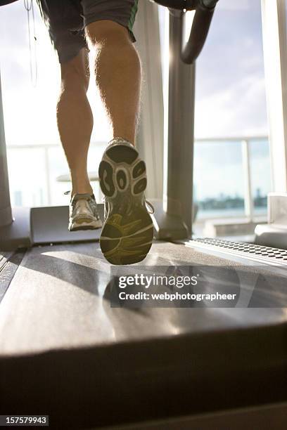 exercising on a treadmill - lower stock pictures, royalty-free photos & images