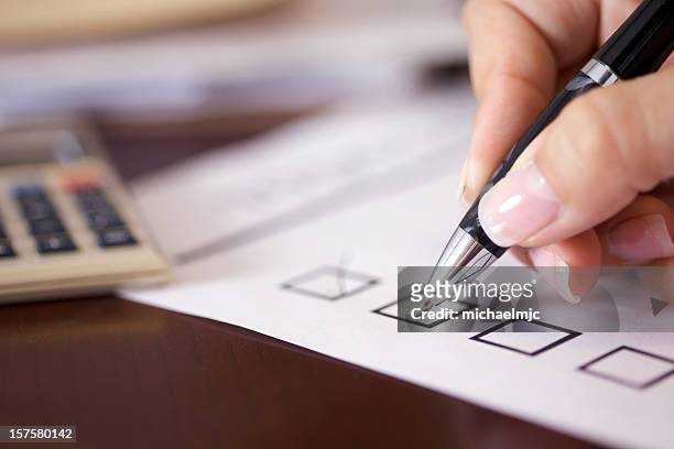 four black checkboxes with one ticked - checklist stock pictures, royalty-free photos & images