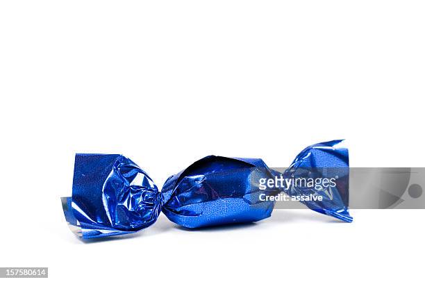 candy bonbon rolled into glittering blue aluminium foil - boiled sweet stock pictures, royalty-free photos & images
