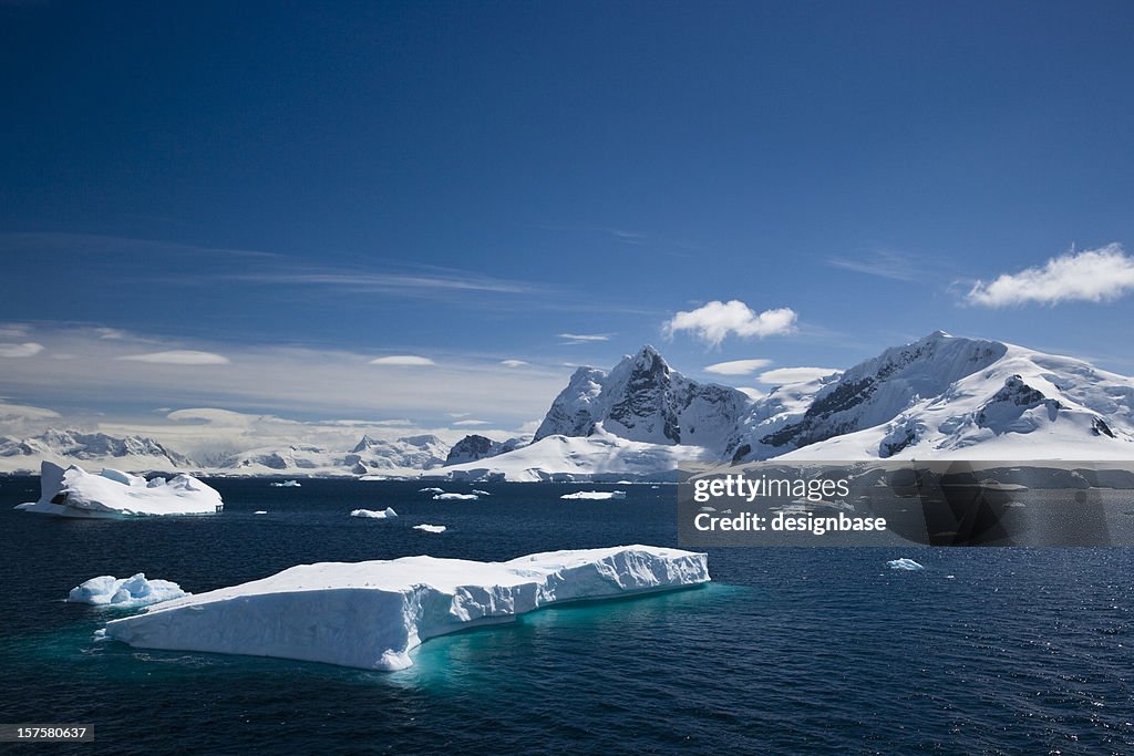 Ice and snowy mountains with water in the Paradise Harbour
