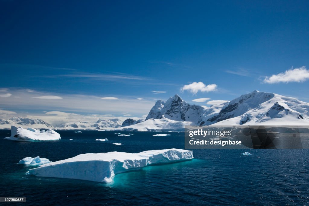 Ice and snowy mountains with water in the Paradise Harbour