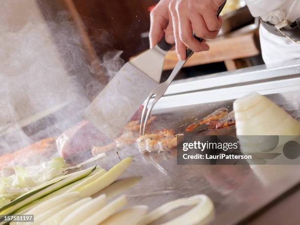 tapanyaki, japanese cooking - teppanyaki stock pictures, royalty-free photos & images