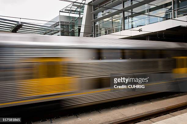 train leaving station - sydney train stock pictures, royalty-free photos & images