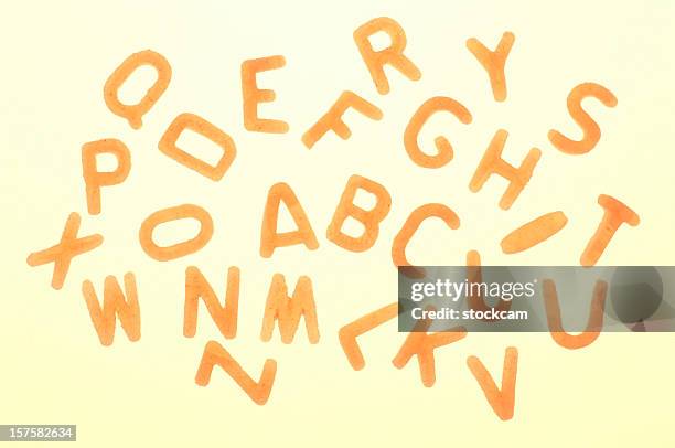 alphabet pasta letters - alphabet soup stock pictures, royalty-free photos & images