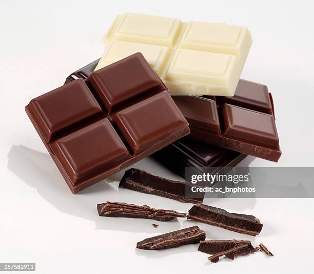 white, dark and milk chocolate bars  - dark chocolate on white stock pictures, royalty-free photos & images