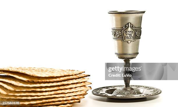 kiddush cup with matzo - passover symbols stock pictures, royalty-free photos & images