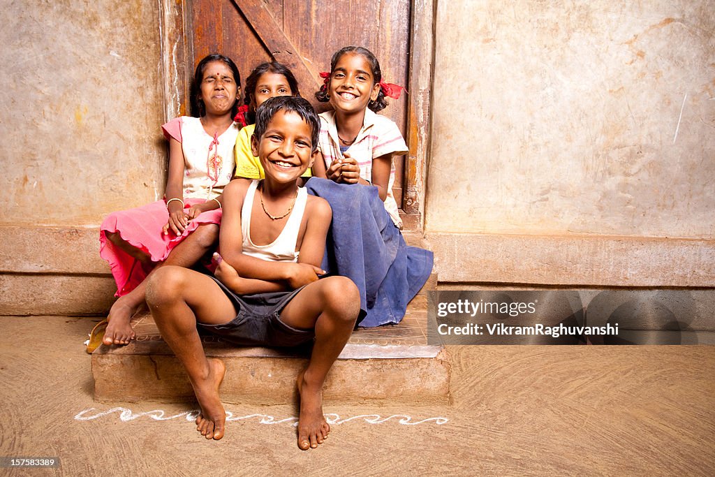 Group of four Cheerful Rural Indian Children