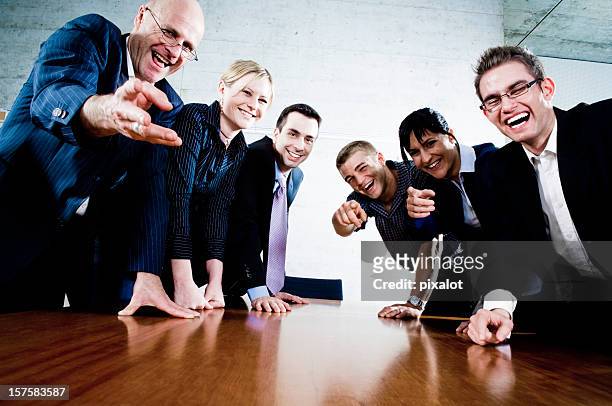 laughing business people - cruel stock pictures, royalty-free photos & images