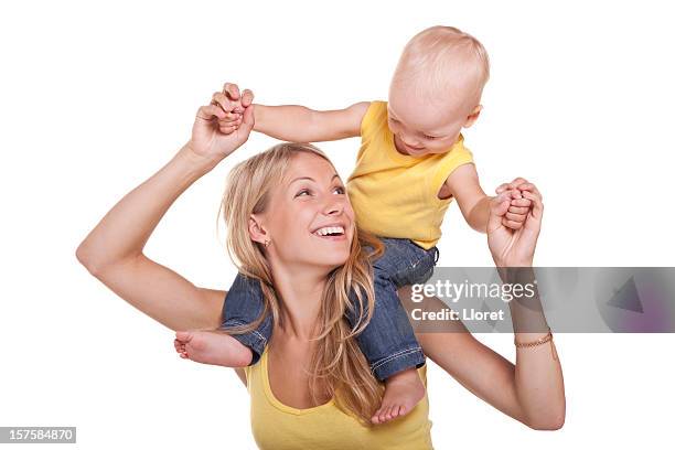 madre sorridente con il suo bambino sulle spalle - baby white background foto e immagini stock