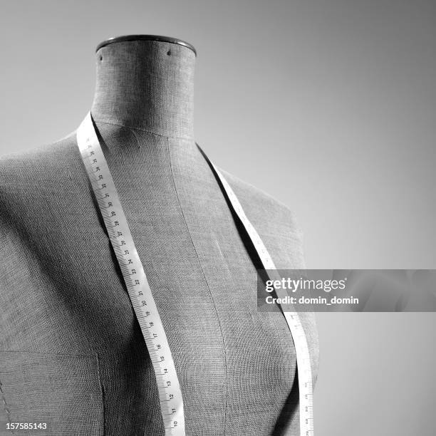 retro female tailor's mannequin torso with measuring tape, black white - dummy fashion stockfoto's en -beelden