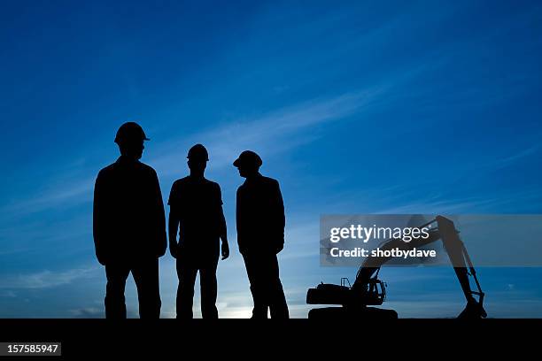 three guys at a construction site - miner stock pictures, royalty-free photos & images