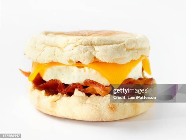 english muffin breakfast sandwich - breakfast to go stock pictures, royalty-free photos & images