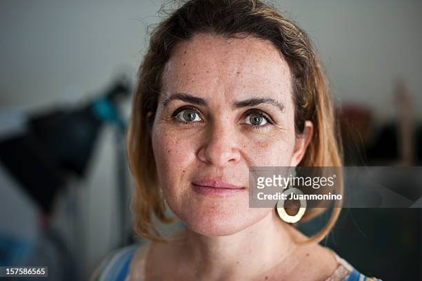 forty something caucasian woman - serious portrait stock pictures, royalty-free photos & images