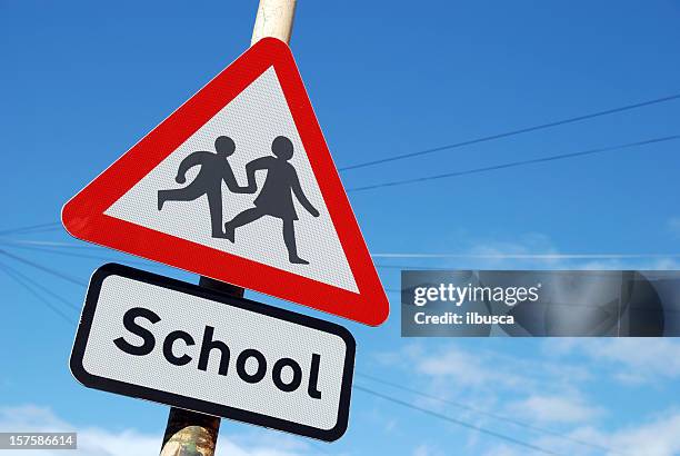 school children crossing sign with copy space - school facade stock pictures, royalty-free photos & images