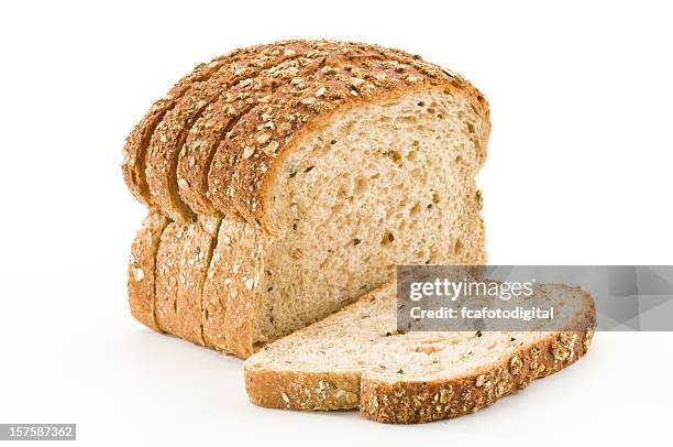 detailed close-up of sliced grain bread on white background - wholegrain stock pictures, royalty-free photos & images