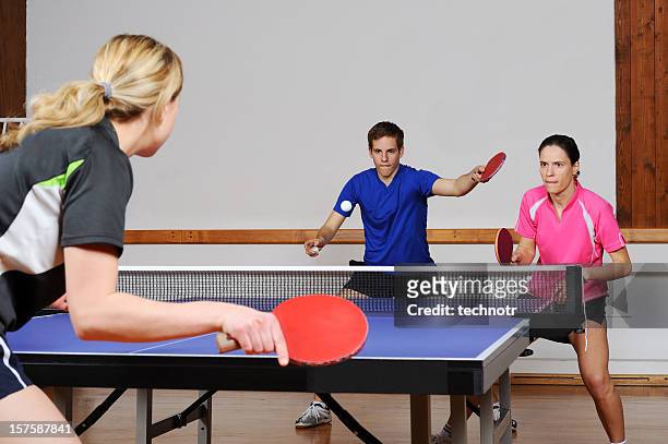 playing table tennis mixed doubles - table tennis stock pictures, royalty-free photos & images