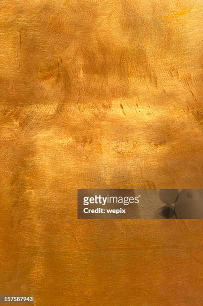 abstract golden copper or bronze metal background xl - brons stockfoto's en -beelden