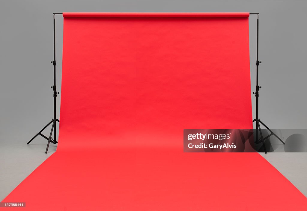 Large red paper rolled onto the floor