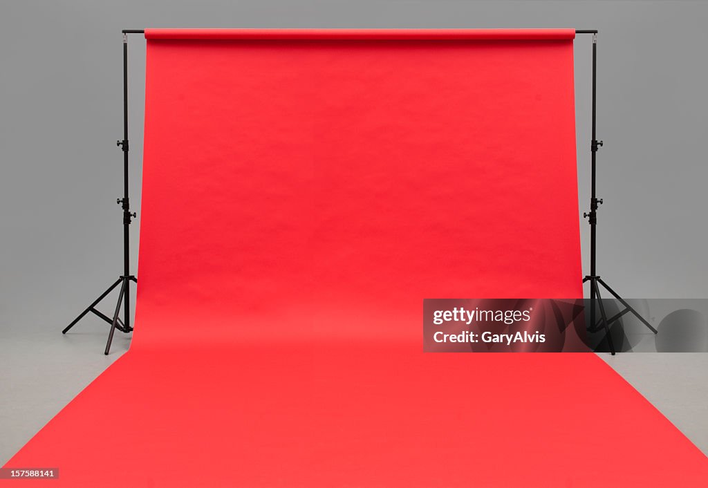 Large red paper rolled onto the floor