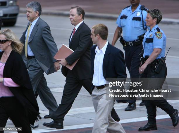 Attorney Daniel Petrocelli and Jeffrey Skilling, former Enron CEO, walk across Smith St. To the Bob Casey United States Court House after lunch on...