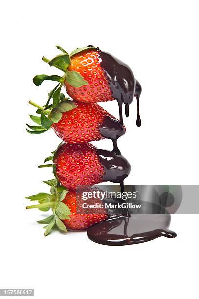 chocolate covered strawberries - chocolate melting stock pictures, royalty-free photos & images