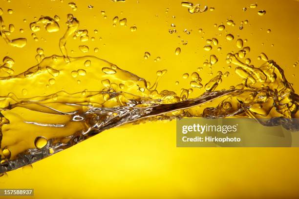 yellow crush - beer splashing stock pictures, royalty-free photos & images