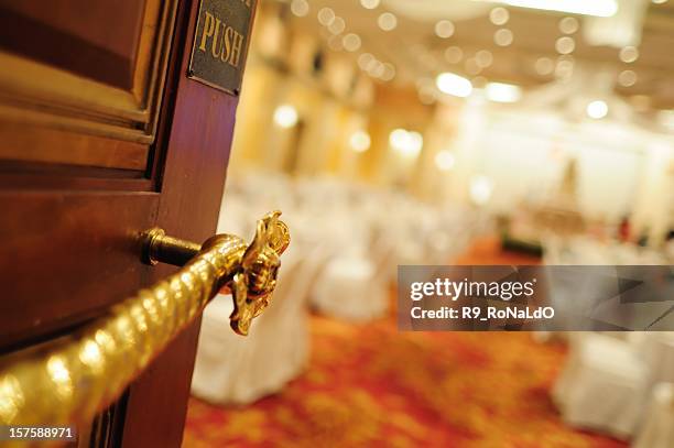 wedding reception hall entrance focus at the door - balzaal stockfoto's en -beelden