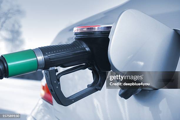 refuel the car - biofuel stock pictures, royalty-free photos & images