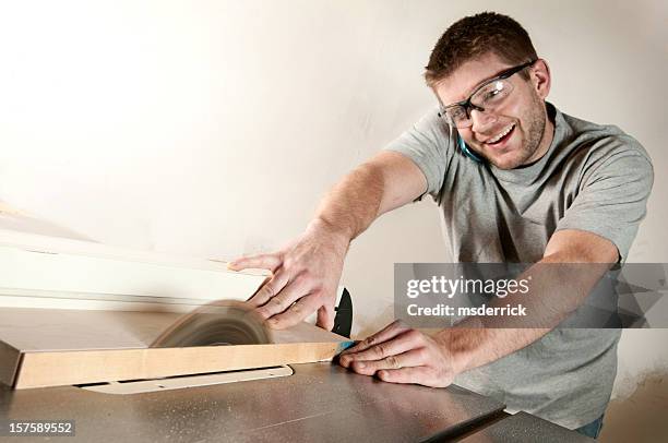 unsafe working habit - table saw stock pictures, royalty-free photos & images