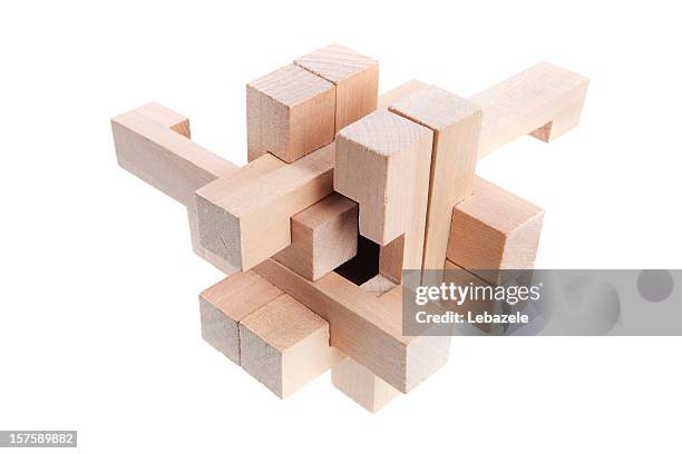 a geometric puzzle made out of wood  - slab white background stock pictures, royalty-free photos & images