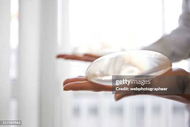 breast implant - silikone stock pictures, royalty-free photos & images