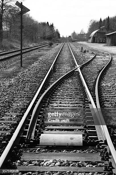 which direction to take - railroad junction - pejft stock pictures, royalty-free photos & images