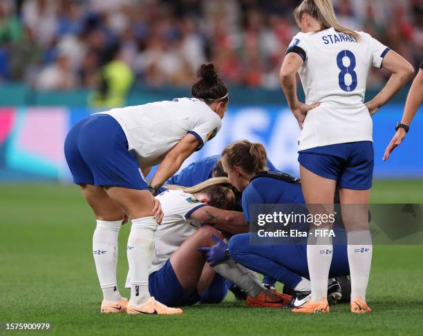 Keira Walsh of England receives medical attention during the FIFA Women's World Cup Australia & New Zealand 2023 Group D match between England and...