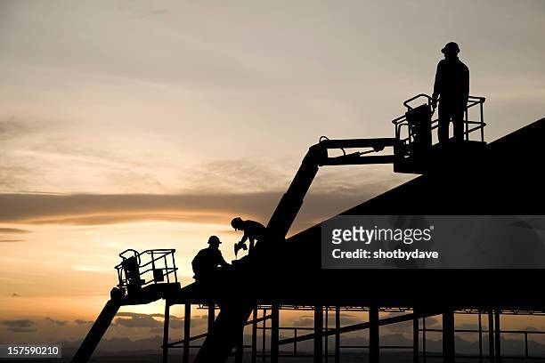 construction lifts - cherry picker stock pictures, royalty-free photos & images