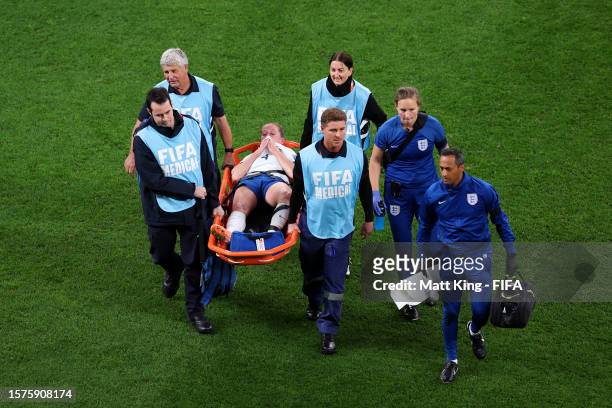 Keira Walsh of England is stretched off after an injury during the FIFA Women's World Cup Australia & New Zealand 2023 Group D match between England...