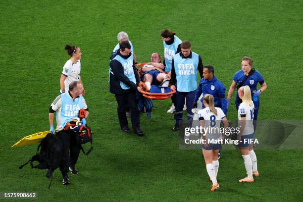 Keira Walsh of England is stretched off after an injury during the FIFA Women's World Cup Australia & New Zealand 2023 Group D match between England...