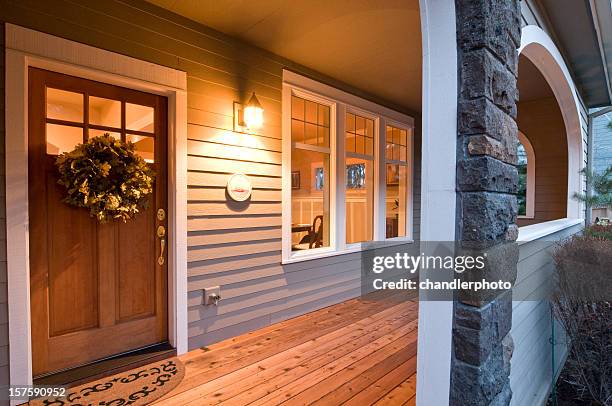 evening glow of the front porch - electric light stock pictures, royalty-free photos & images