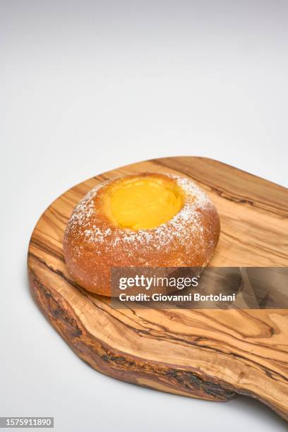 italian custard donut - zeppole stock pictures, royalty-free photos & images